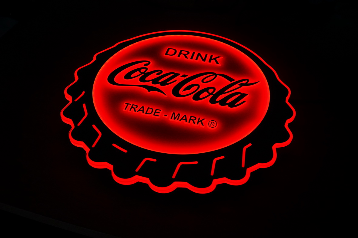 Bright Coca-Cola illuminated sign